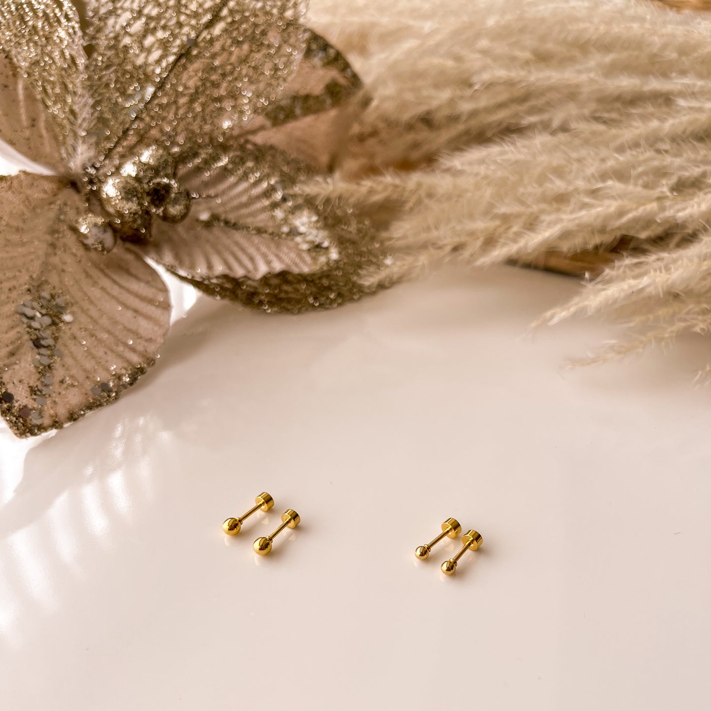 Arte mini bolitas doradas acero