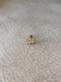 Piercing flor brillante