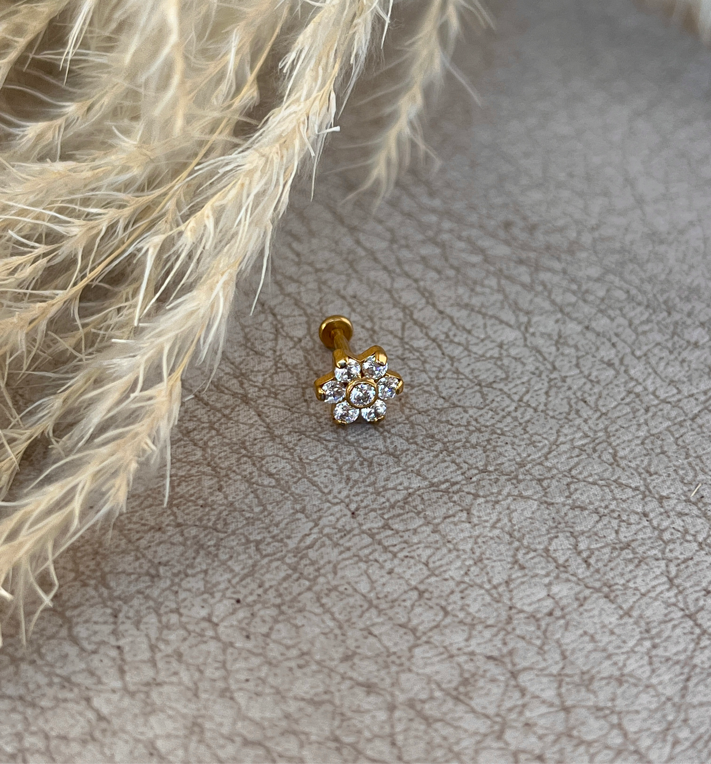 Piercing flor brillante