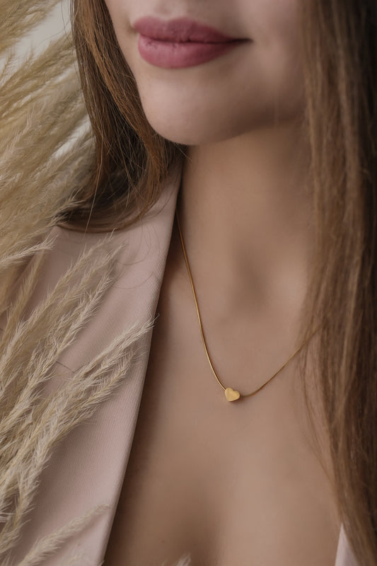 Collar corazón pasante